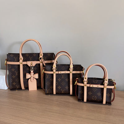 Set of three LV handbags with monogram pattern, Louis Vuitton Trio Pouch conversion
