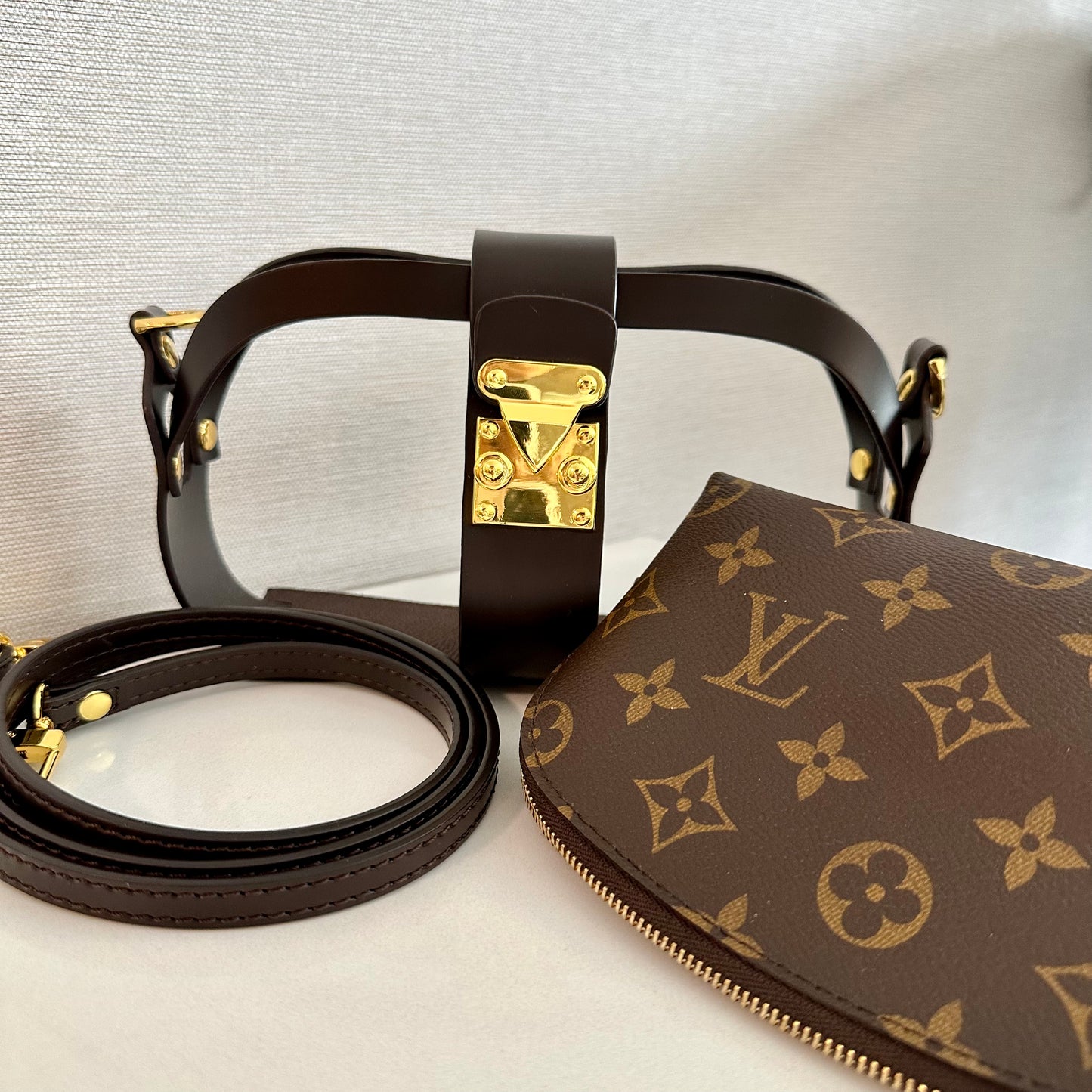 louis vuitton cosmetic pouch with strap